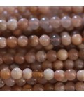 Pierre du soleil 4 mm environ perle ronde mixte A Afrique du Sud