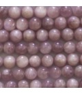 Kunzite 6/6.2 mm environ perle ronde A+ Tanzanie