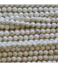 Ivory howlite 4 mm faceted round bead