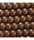 Hématite cuivrée 8 mm environ perle ronde, trou diamètre 3 mm environ
