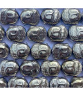 Hematite 7x10mm golden Buddha