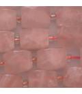 Quartz pink about 12x18 mm faceted barrel Madagascar