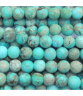 Jasper impression 6 mm matt turquoise tinted round bead