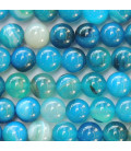 Agate 8/8.4 mm environ perle ronde bleu veinée (agate chauffée)