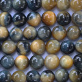 Golden eye blue 8/8.2 mm environ perle ronde AA Afrique