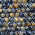Golden eye blue 6 mm environ perle ronde AA Afrique
