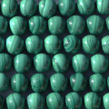 Malachite 8/8.2 mm environ perle ronde ton médium AA Congo