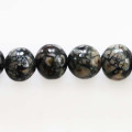 Perle ronde bois verni noir/gris 12 mm environ Indonésie