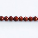 Jaspe rouge 6/6.6 mm environ perle ronde A Vénézuela