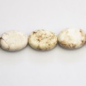 Howlite 13x18 mm oval flat ivory
