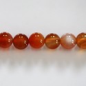 Cornaline naturelle mixte 8 mm environ perle ronde A+ Madagascar